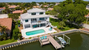 Elevated coastal home construction in St. Pete with V-zone flood protection features, built by Pelican Bay Home Builders.